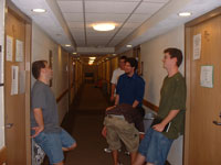 Disillusioned college students stand in silence.